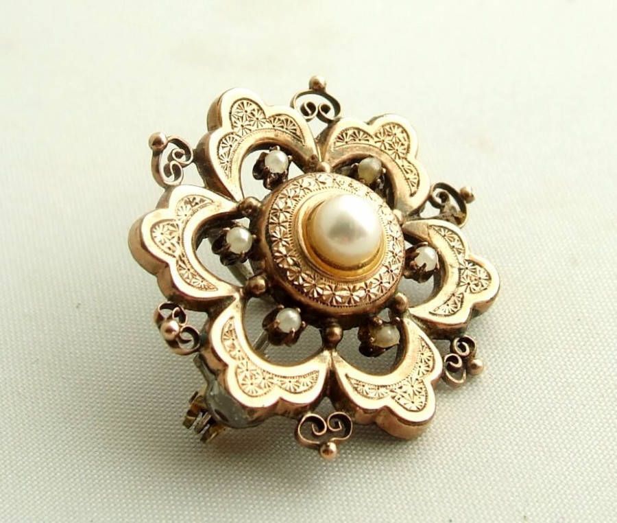 Christian Goud en zilveren broche met parels