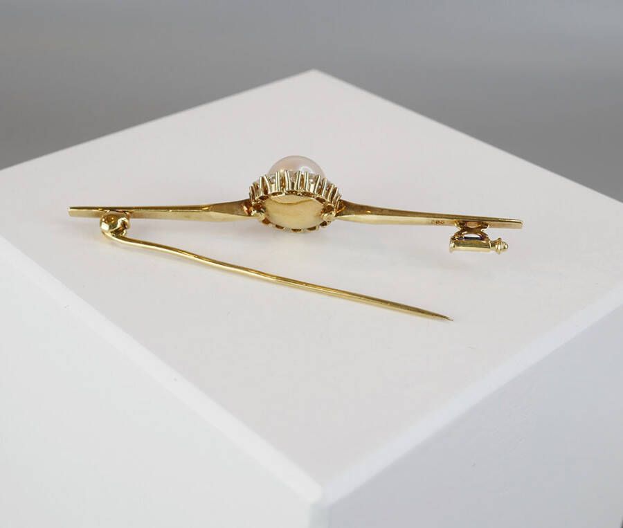 Christian Gouden broche met bolsjewieken