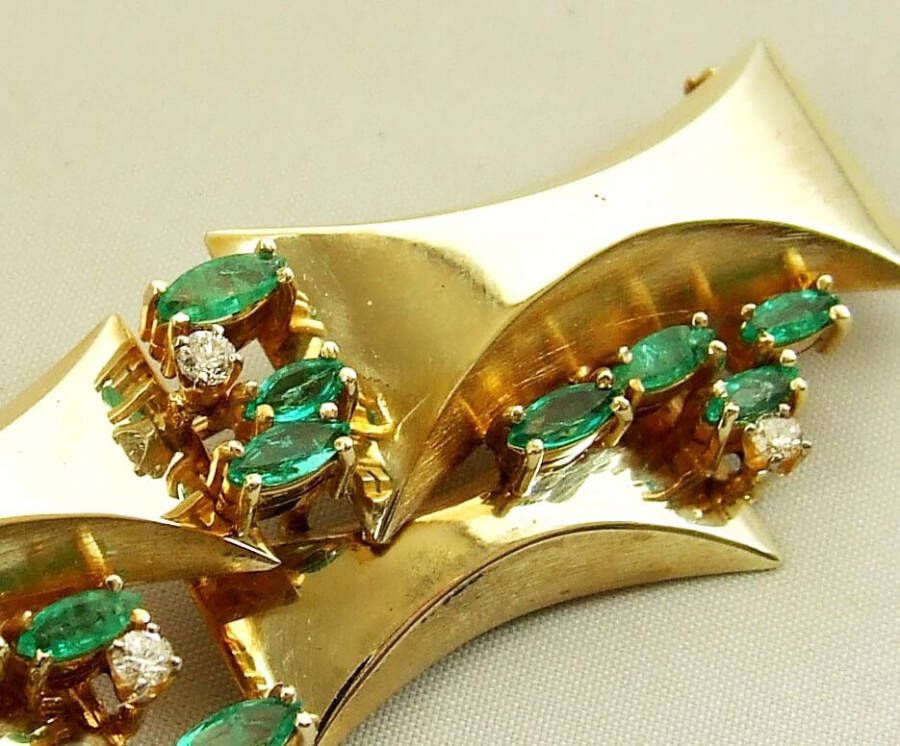 Christian Gouden broche met diamanten en smaragd