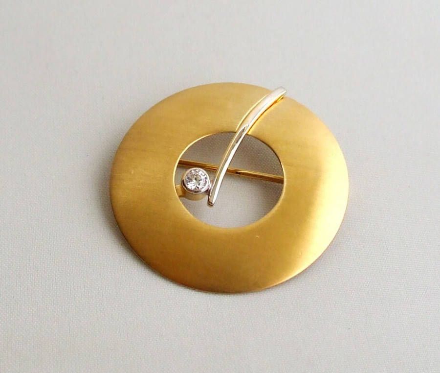 Christian Gouden broche met zirkonia